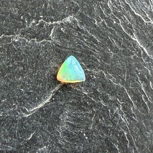 Elegant Ethiopian Opal Triangle loose gemstone.94 carats.